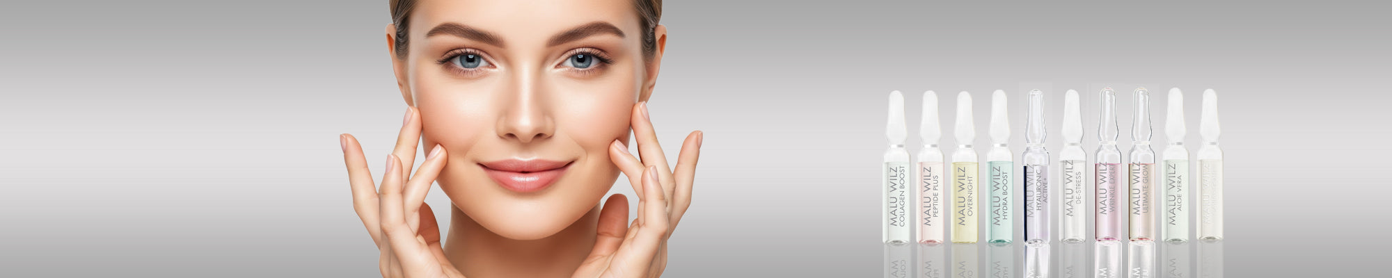 Close-up einer Frau mit Fingerspitzen am Gesicht vor hellgrauem Hintergrund; seitlich die MALU WILZ Concentrates.