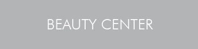 Download-Link für Beauty Center – grauer Button mit weißem Schriftzug BEAUTY CENTER