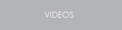Download-Link für Videos – grauer Button mit weißem Schriftzug VIDEOS
