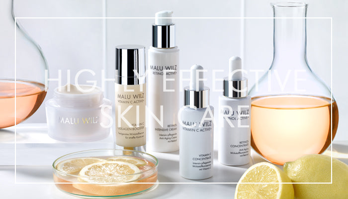 Produktgruppe Retinol & Vitamin C Active+ mit Zitronen und Reagenzgläsern