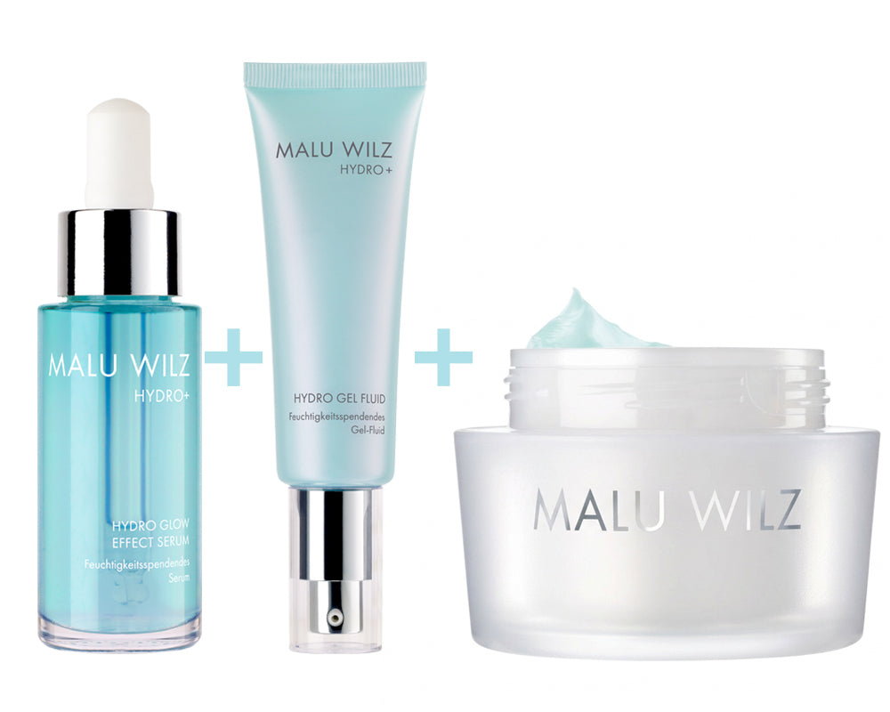 Kombination aus drei Malu Wilz Hydro+ Pflegeprodukten: Hydro Glow Effect Serum, Hydro Gel Fluid und Hydro Glow Moisture Cream.